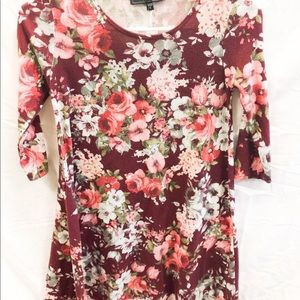 Woman’s short quarter length sleeve floral dress